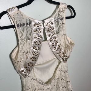 Beautiful Ivory sequin gemstone open back dress